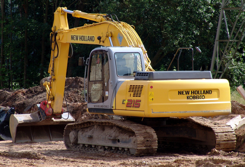 NEW_HOLLAND_215_Raupenbagger.thumb.JPG.eab65811d296d9527e1e697e3880d5db.JPG